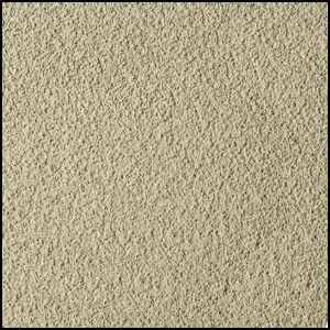 Close-up view of a textured beige surface, resembling stucco or rough plaster, with a consistent, grainy pattern throughout.