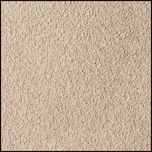 Close-up view of a beige, rough-textured surface, possibly sandpaper or stucco, with a slightly grainy appearance and consistent color throughout.