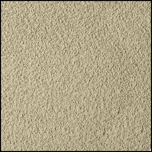 Close-up view of a textured beige surface, resembling stucco or rough plaster, with a consistent, grainy pattern throughout.