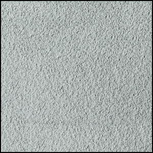 Close-up view of a light gray, textured surface resembling carpet or fabric, with a slightly speckled and soft, fibrous appearance.
