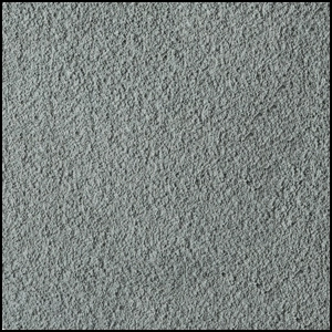 A close-up view of a textured gray surface, resembling rough concrete or stucco, with a consistent pattern and slightly uneven finish.