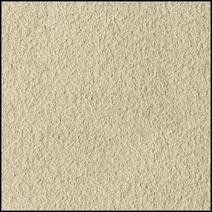 Close-up view of a beige, sandy, and slightly rough textured surface, resembling fine sandpaper or compacted sand.