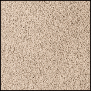 Close-up view of a beige, rough-textured surface, possibly sandpaper or stucco, with a slightly grainy appearance and consistent color throughout.