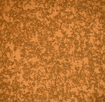 A textured surface with an orange and brown speckled pattern, resembling rust or a corroded metal sheet.
