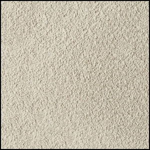 Close-up of a textured, light beige surface resembling sandpaper or rough plaster, with a consistent grainy appearance across the entire image.