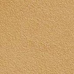 A close-up view of a surface with a sandy beige color and a slightly rough, textured appearance.