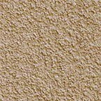 Close-up view of a textured beige surface, resembling sandpaper or rough plaster, with a uniform, grainy appearance.