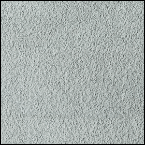 Close-up view of a light gray, textured surface resembling carpet or fabric, with a slightly speckled and soft, fibrous appearance.